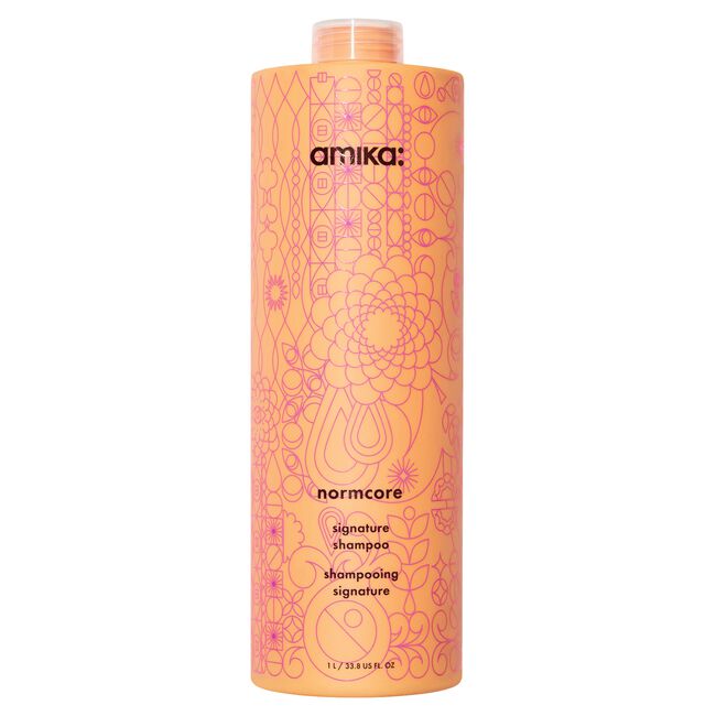 Amika Normcore signature shampoo bottle on a white background - Hair Care Canada