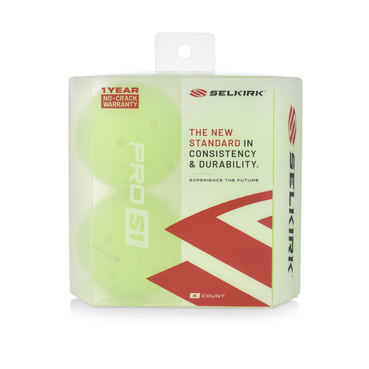 Front view of Selkirk Pro S1 4-pack pickleballs showing bright yellow balls in clear packaging with 1 Year No-Crack warranty