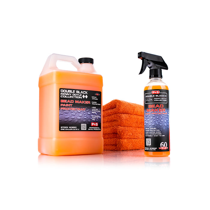 A jug and spray bottle of P&S Bead Maker with a stack of orange towels on a white background.