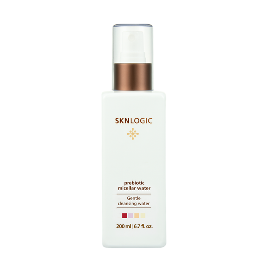 SKN145 Prebiotic Micellar Water 200ml | SKNLOGIC Prebiotic Micellar Water in a 200 ml white bottle with a metallic bronze pump collar and clear cap, shown on a plain white background.