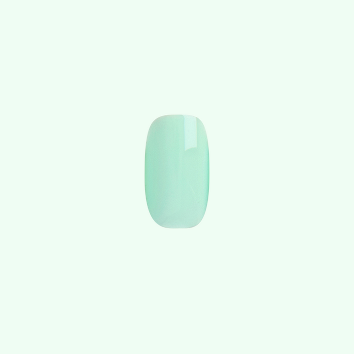 Single short squoval press-on nail in pastel mint green, Sleeping Bag | Squoval | Short, for at home mani.