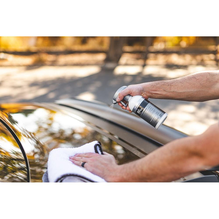 Koch Chemie Spray Sealant S0.02 500ml spraying on a car.